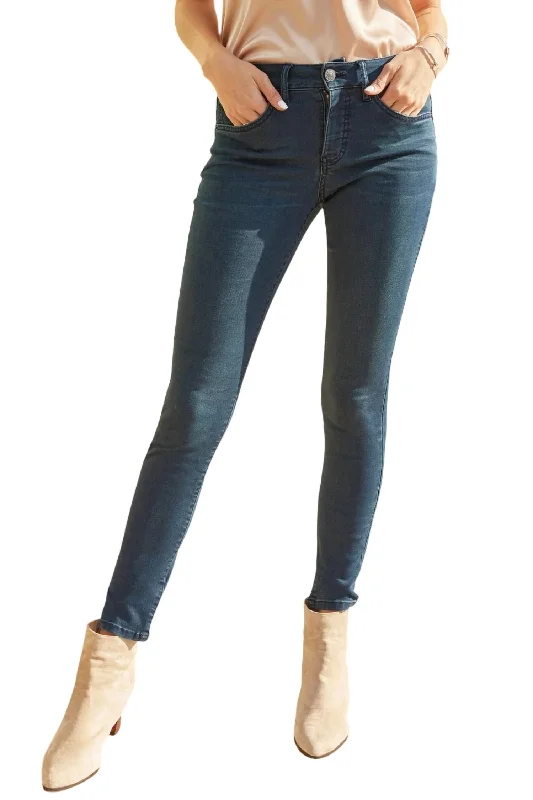 Ripped and repaired jeans for a rugged lookMissy Hyperdenim Super Stretchy Basic Skinny Jean In Blue Black