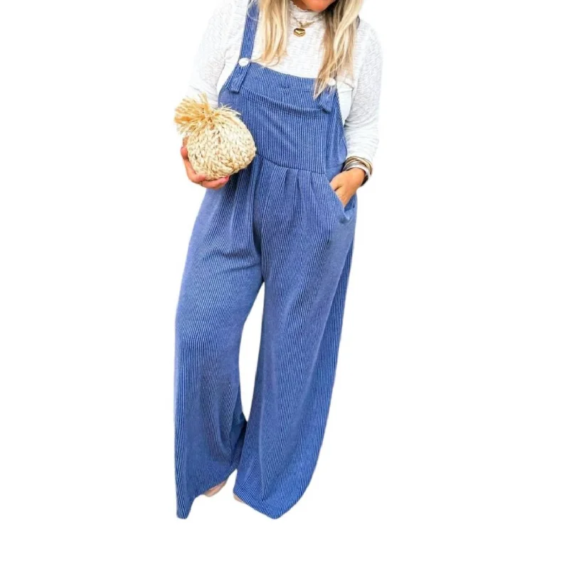 Stretch denim with spandex for added flexibilityKarli Boho Overalls In Blue