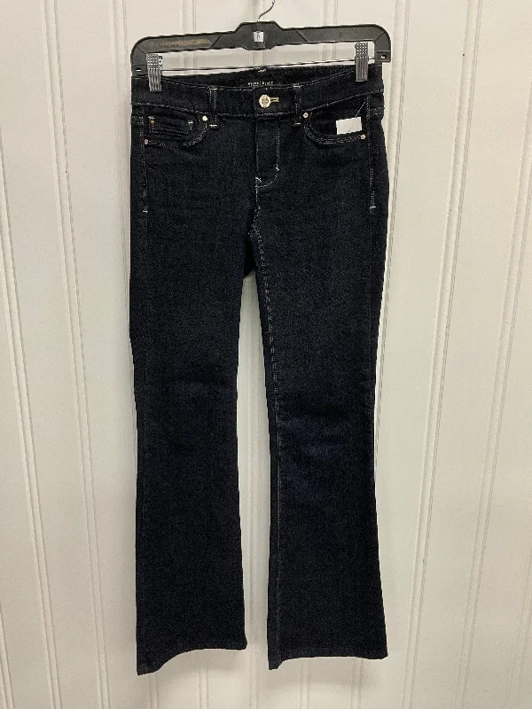 Dark denim jeans with subtle cat-eye fadesJeans Flared By White House Black Market In Blue Denim, Size: 0