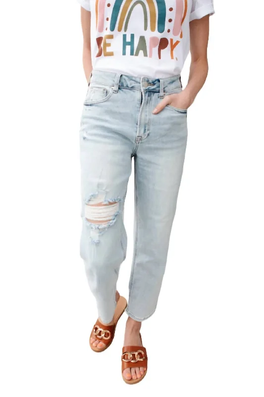 Bootcut jeans with a high waist for a flattering fitNew Me Distressed Jeans In Light Wash